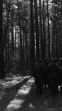 Historical Re-enactment Black And White Video. Squad Men Dressed As World War II Russian