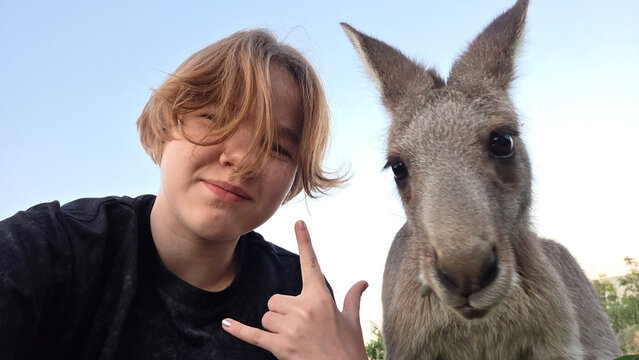 Teenager and Kangaroo Close Up Selfie Outdoors