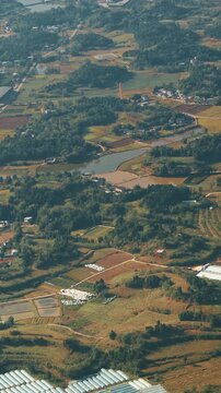 View From Airplane Window On Surroundings Of Chengdu, China. Development Of Agriculture In China. Wooded Terrain Landscape Of China. Porthole View Or Called Bull's-eye Window On Rice Fields. Discover