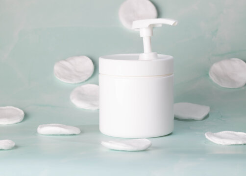 White, pump lotion or soap bottle. Cosmetic packaging mockup. Beauty skin care concept. Side view