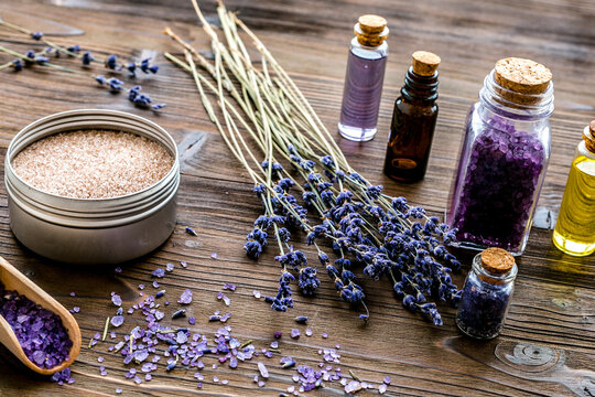 organic cosmetics with lavender on wooden background