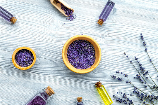 organic cosmetics with lavender on wooden background top view