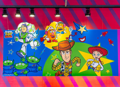 Bangkok, Thailand - September 4, 2025 : Toy Story movie wallpaper backdrop display with Jessie, Buzz Lightyear and Woody, a famous character in movie theatre.