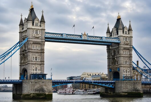 Tower Bridge Over the River Thames in London England Under Dramatic Cloudy Sky