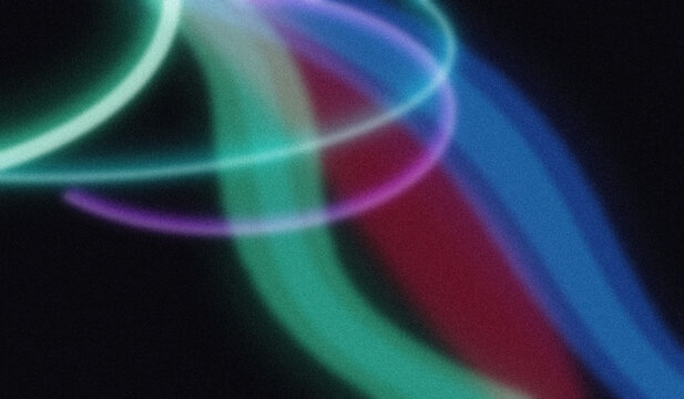 Abstract glowing light trails creating dynamic wavy lines and vibrant patterns on a dark background