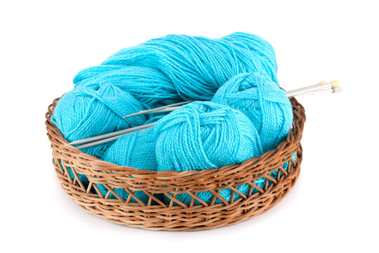 Balls of yarn with knitting needles, isolated on white background .