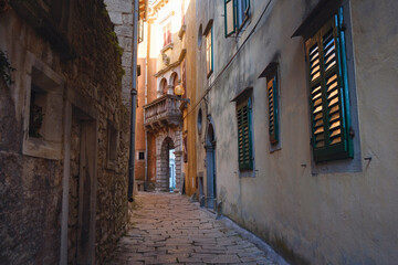 Obraz premium Scenic views of old town Labin in Istria, Croatia. Historic stone houses, tiled roofs, church facade, cozy narrow streets,