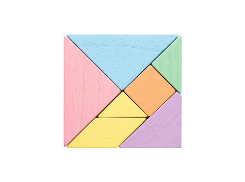 Colorful tangram puzzle wooden geometric shapes assembled into square top view isolated on black background for business strategy logic problem solving creative solution education concept.