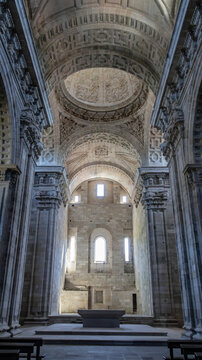 Interior of stone church with granite vault and simple design altar