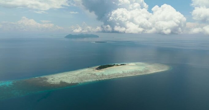 Seascape with tropical islands and blue ocean. Tun Sakaran Marine Park. Borneo, Sabah, Malaysia.