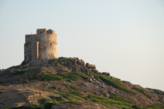 The Spanish Tower of San Giovanni in Sinis, near the sea, overlooks the archaeological site of Tharros, in the municipality of Cabras, Italy.