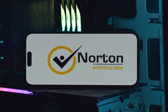 On a mobile phone screen logo Norton Corp global computer security software company.
