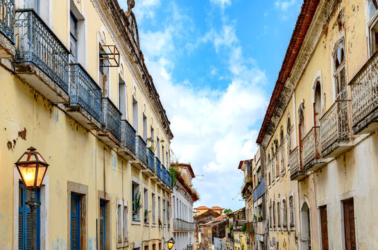 A historic street featuring old colonial-style mansions in the city of Sao Luis, Maranhao.