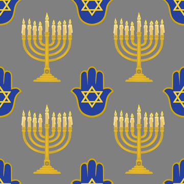 Hanukkah seamless pattern vector with golden menorah and blue hamsa hand symbols on grey background