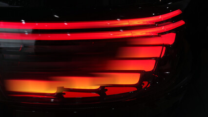 Close-up of Modern Car Tail Light at Night © nana