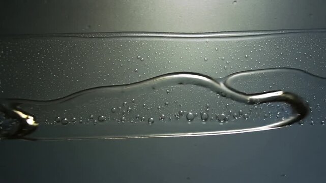 Forming waves, upper and lower filaments shifting and bulging on smooth panel bubbles aligning