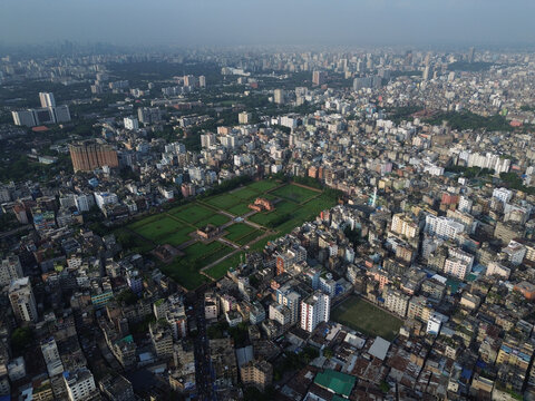 Aerial view of Lalbagh Fort surrounded by dense urban landscape, historic architecture, and green gardens in Dhaka, Dhaka Division, Bangladesh.