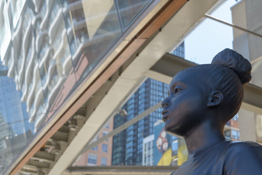 head shot of Thomas J Price&rsquo;s "Moments Contained" a nine-foot Black woman statue, currently outside the AGO, Toronto