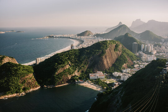 Aerial view from Sugarloaf Mountain of Praia Vermelha (Red Beach) in the foreground with Copacabana and Leme Beach in the distance, Rio de Janeiro, Brazil