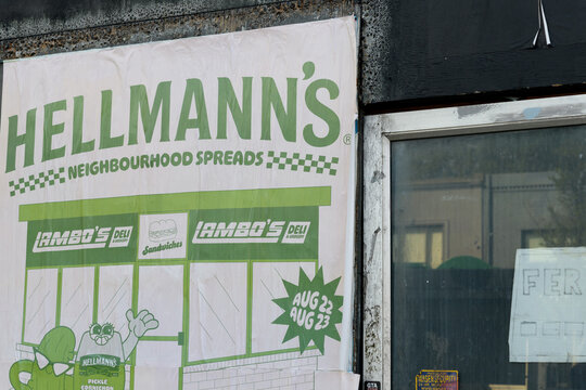 wheatpaste poster with Hellmann's x Lambo's Deli advertisement in Toronto