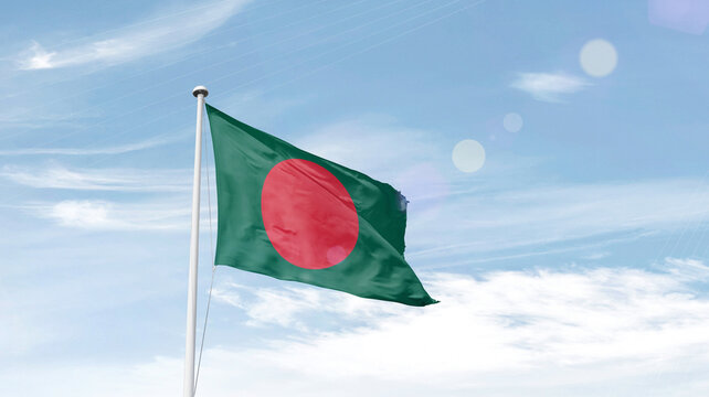 Bangladesh national flag waving in sky.