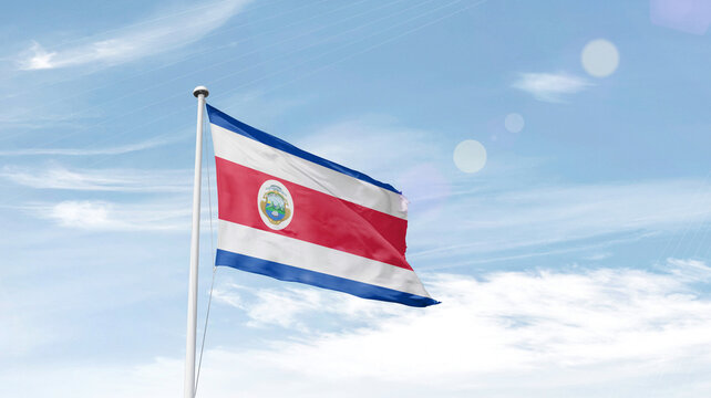 Costa Rica national flag waving in sky.