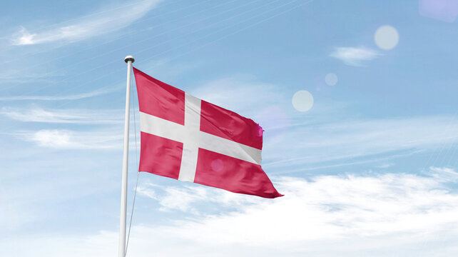 Denmark national flag waving in sky.