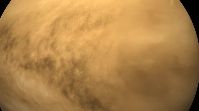 Venus planet atmosphere view from space, thick yellow clouds swirling in orbit.