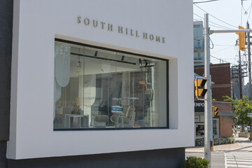 Obraz premium window and sign on the exterior of South Hill Home, a high-end furniture and interior-design showroom, located at 146 Dupont St (at Davenport Rd), Toronto