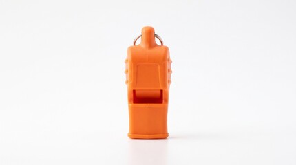 Obraz premium Orange plastic whistle standing on white background