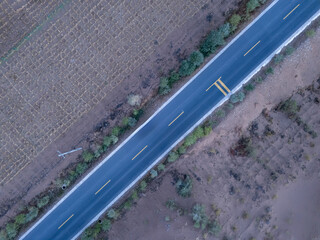 Naklejka premium aerial drone view of desert highway landscape