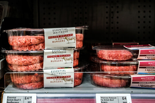 Close-Up Product Shot Of Essential Waitrose Higher Welfare Packs Of Two And Four British Beefburgers With Price Tags
