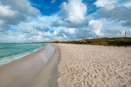 Scenic view of Arashi Beach in Aruba with the California Lighthouse in the background, located in the Hudishibana area in the northeastern part of the island.