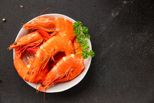 Shrimp fresh seafood natural ingredient &nbsp;pescatarian diet delicious snack gourmet dish table setting rustic style dish top view copy space keto or paleo diets vegetarian food