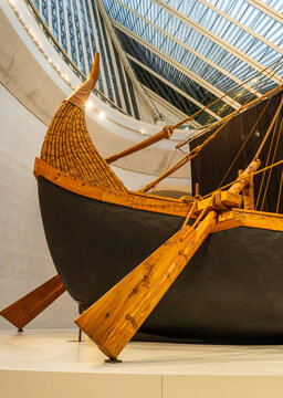 View of a traditional wooden dhow displayed inside the modern architecture of the Zayed National Museum in Abu Dhabi, Abu Dhabi, United Arab Emirates.