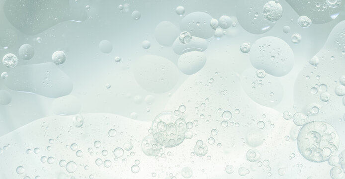 Abstract Blue water bubbles essential oil beauty collagen Serum Repair cell background.