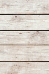 Light weathered wooden plank texture featuring natural grain, knots, subtle cracks, and horizontal board lines. The pale wood tones create a clean rustic and Scandinavian-inspired aesthetic, making th © alongkorn89