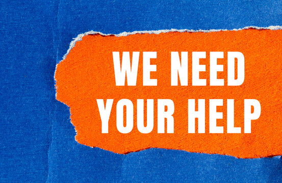 We need your help message written on ripped torn paper background. Conceptual We need your help symbol. Copy space.