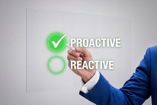 Business professional choosing proactive over reactive strategy on a glass board.