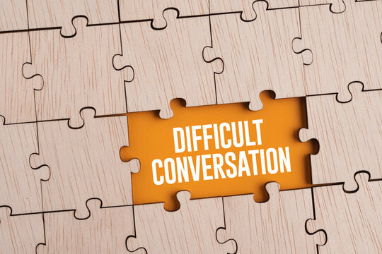 Wooden puzzle with the word DIFFICULT CONVERSATION. difficult concept of conversation.