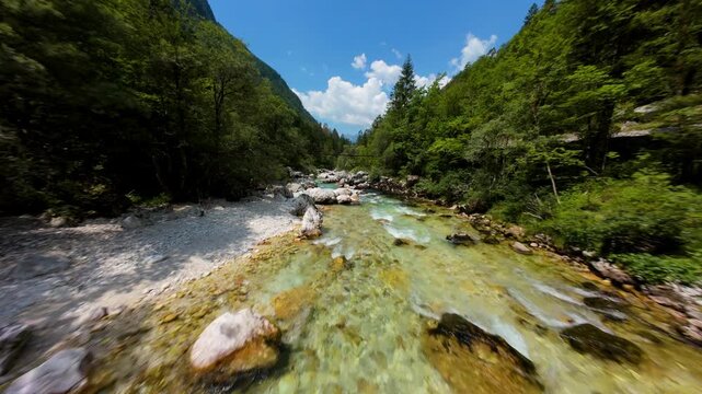 Crystal-clear Water Flowing Through Rocky Soca Valley In Slovenia. - aerial FPV shot