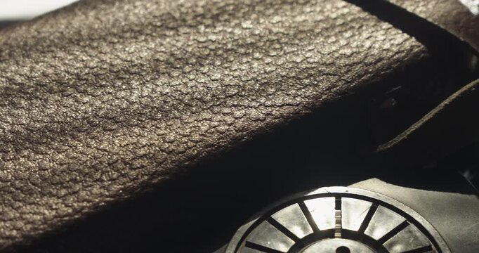 Macro pan reveals a vintage police walkie talkie with protective case, creating a cinematic background for surveillance, communication and investigative concepts.