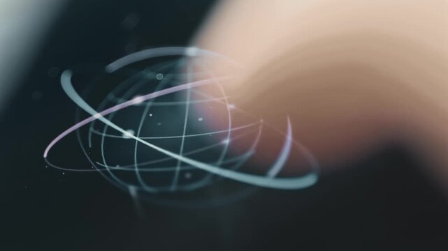 Wireframe globe follows intersecting orbital paths