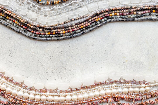 Lots of gemstones and pearls beads for jewelry, top view