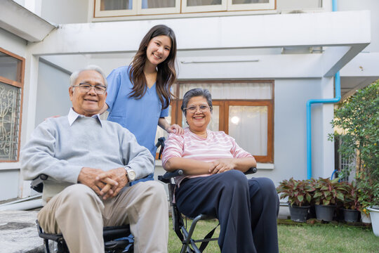 Family members spend time together outdoors in a garden
