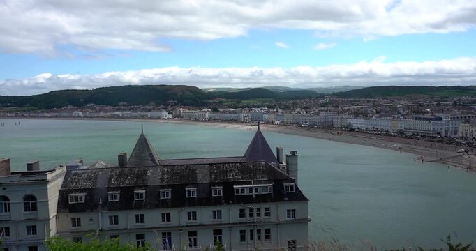 Historic hotel and Llandudno Bay in Wales