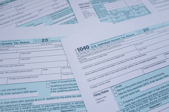 Close up Background of Official US IRS Form 1040 Tax Papers for Financial Analysis and Planning