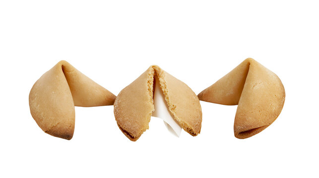 Three crispy golden fortune cookies with one broken open revealing a paper slip