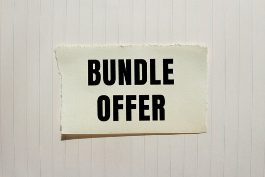 Bundle Offer message written on ripped torn paper background. Conceptual Bundle Offer symbol. Copy space.