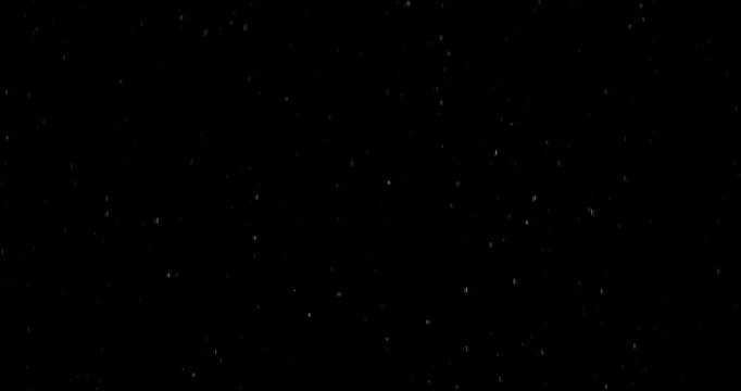 Slow motion floating water droplets on a black background. Premium VFX overlay for cinematic compositing, motion graphics, title animations, trailers and professional visual effects.